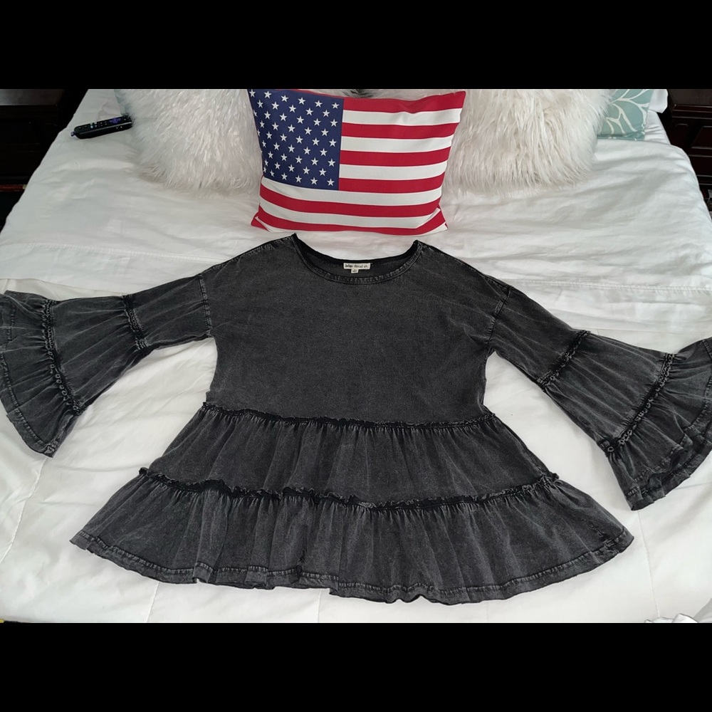 Adorable tunic length baby doll top.